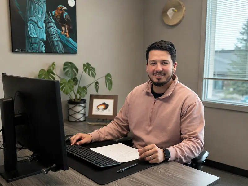 Arrow sales representative at his desk